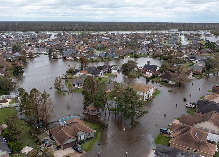 Flooded streets and homes are shown in the Spring Meadow subdivision of LaPlace, Louisiana, after Hurricane Ida moved through Aug. 30.