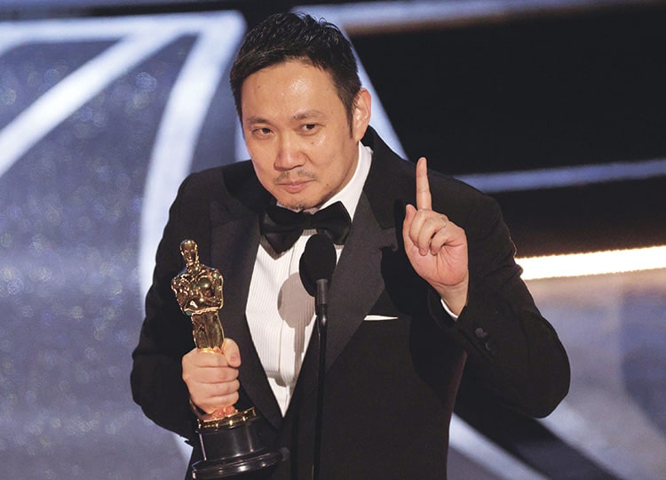 Director Ryusuke Hamaguchi accepts the Academy Award for best international film for Drive My Car during the 94th Oscars at the Dolby Theatre in Los Angeles on March 27.