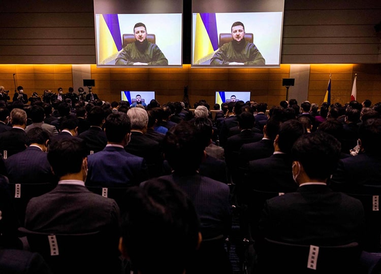 Ukrainian President Volodymyr Zelenskyy speaks to members of Japan’s Lower House via a video link at the House of Representatives office building in Tokyo on March 23.