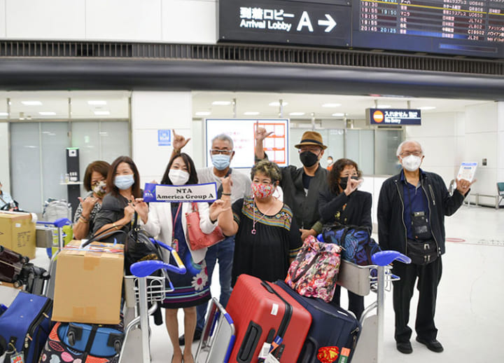 Japan to ask foreign tourists to wear masks, take out insurance against COVID-19