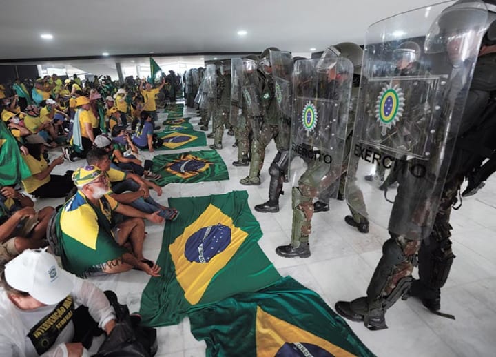 Pro-Bolsonaro rioters storm Brazil’s top government offices
