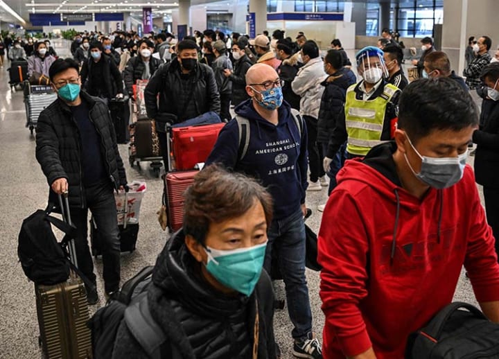 China reopens borders in final farewell to ‘zero-COVID,’ sparking homecoming rush