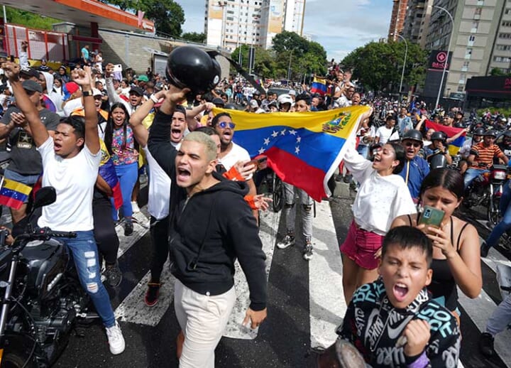 Protests break out across Venezuela as Maduro claims election win